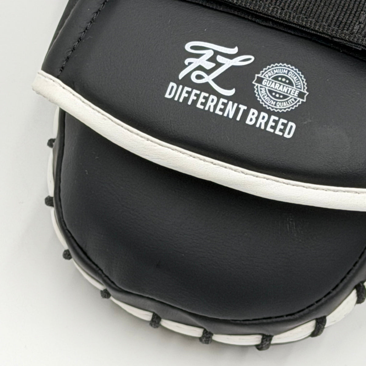 Close-up of Fightlab Edge Advanced mitt with FL Different Breed logo
