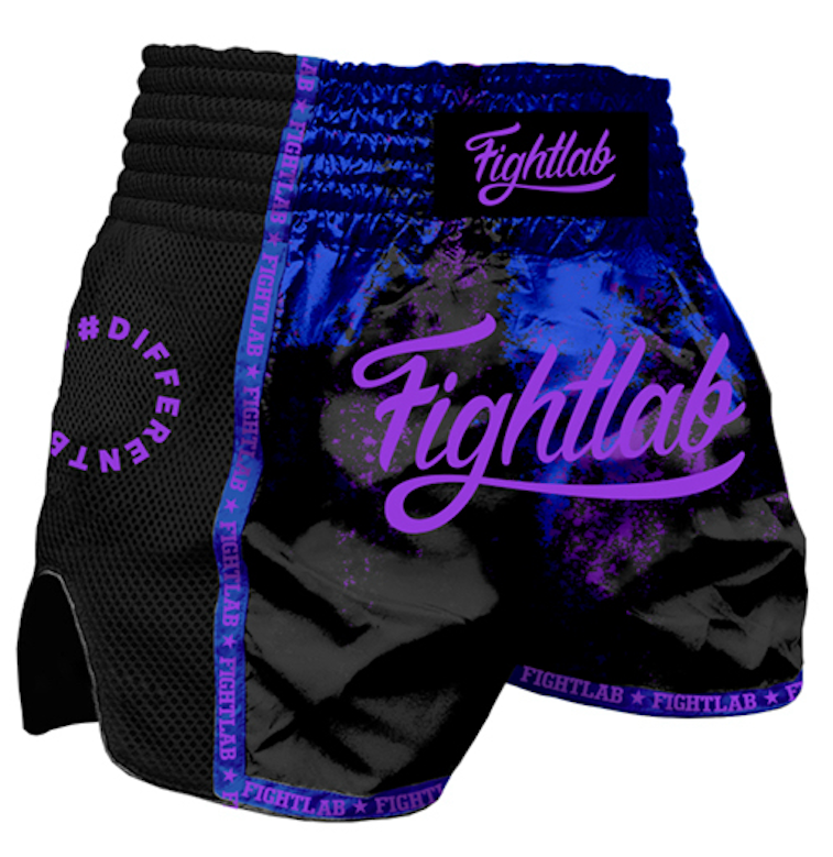 Black and blue Fightlab athletic shorts with branding on a white background